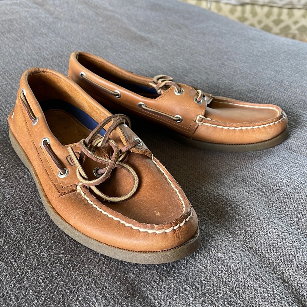 Medium brown leather Sperry boat shoes.